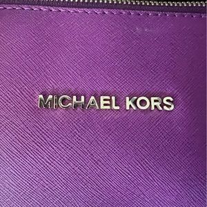 Used purple Michael Kors purse